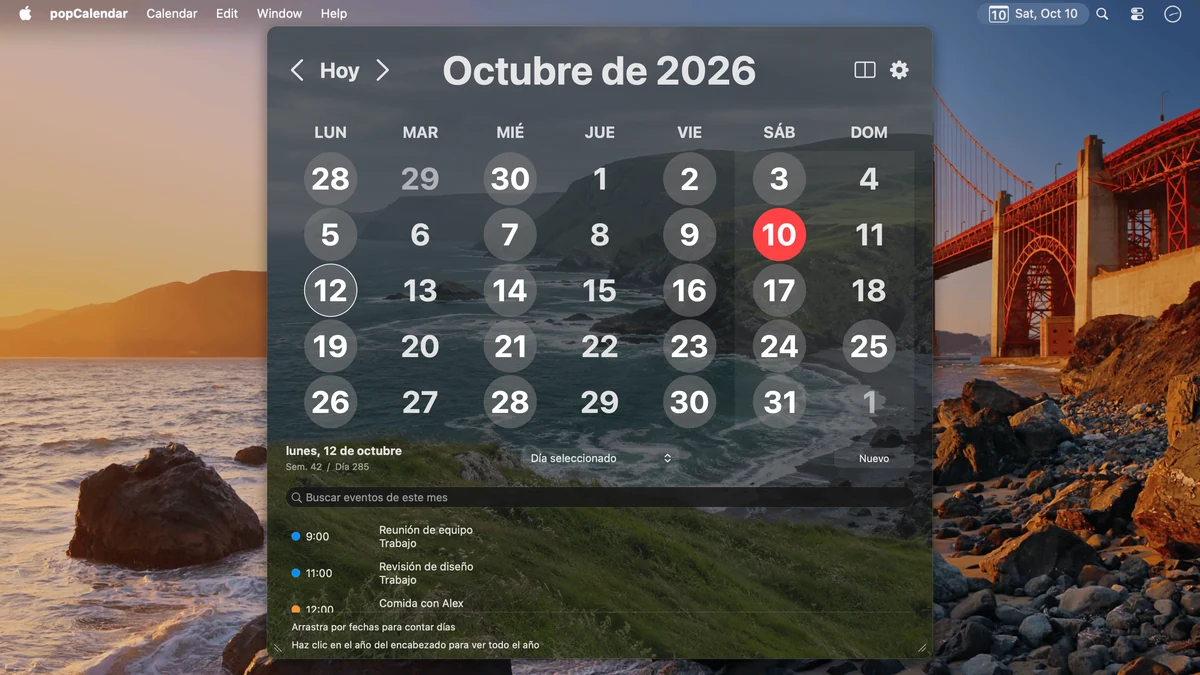 Octubre de 2026 sobre una foto costera personalizada que llena la ventana del calendario.
